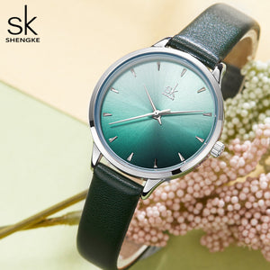 green leather strap watch